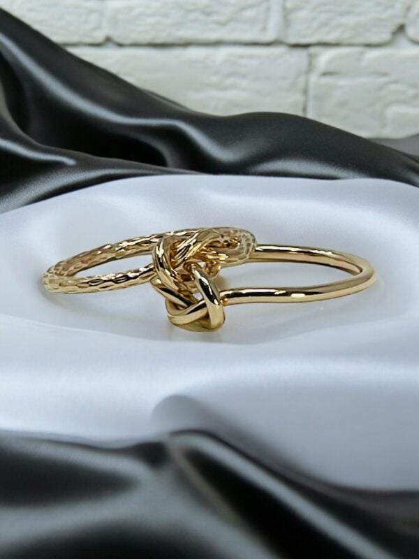 Chunky gold double love knot ring, handmade elegant design with beautiful facets